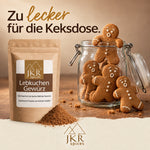 JKR Spices Lebkuchengewürz neben einer Keksdose voller Lebkuchenmännchen.
