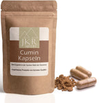 Cumin Kapseln im braunen JKR Doypack mit geöffneten Kapseln und Cuminpulver davor – hochwertige Gewürzkapseln in veganer Form