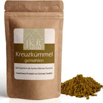 Kreuzkümmel gemahlen im braunen JKR Doypack mit gelb-braunem Cuminpulver daneben – aromatisches Gewürz für orientalische Küche