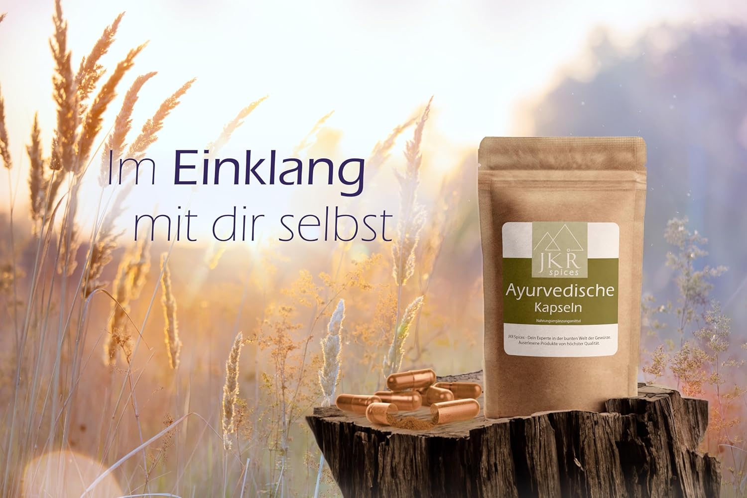 Ayurvedische Kapseln von JKR in ruhiger Naturkulisse mit Sonnenlicht, Fokus auf innerem Gleichgewicht und ganzheitlichem Wohlbefinden