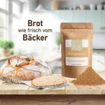 Brotlaib und JKR Spices Brotgewürz vor rustikalem Hintergrund – für aromatisches Brot wie vom Bäcker
