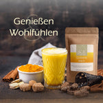 Goldene Milch mit Zimt, Kurkuma und JKR Doypack im warmen Ambiente – wohltuendes Getränk für kalte Tage
