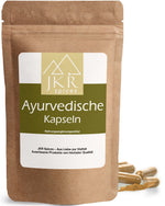 JKR Ayurvedische Kapseln im kraftpapier Doypack mit ausgestreuten Kapseln und feinem Pflanzenpulver, hochwertiges natürliches Produkt für ganzheitliche Unterstützung