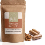 JKR Spices Nelken Kapseln im Doypack, Kapseln mit Nelkenpulver daneben, Produktfoto auf weißem Hintergrund