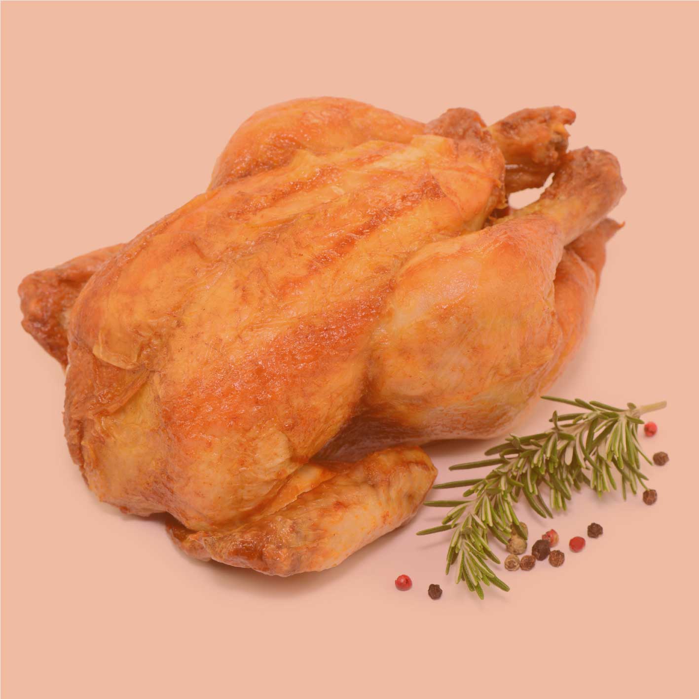 Gewürztes, ganzes Brathähnchen mit Kräutern auf hellem Hintergrund – servierfertiges Beispielgericht