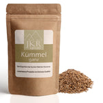 JKR Spices Kümmel ganz im Doypack, ganze Kümmelsamen als Häufchen neben der Packung, Produktfoto auf weißem Hintergrund
