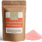 JKR Spices Kuttermittel mit Umrötung im Doypack, rosa Pulver als Häufchen neben der Packung, Produktfoto auf weißem Hintergrund